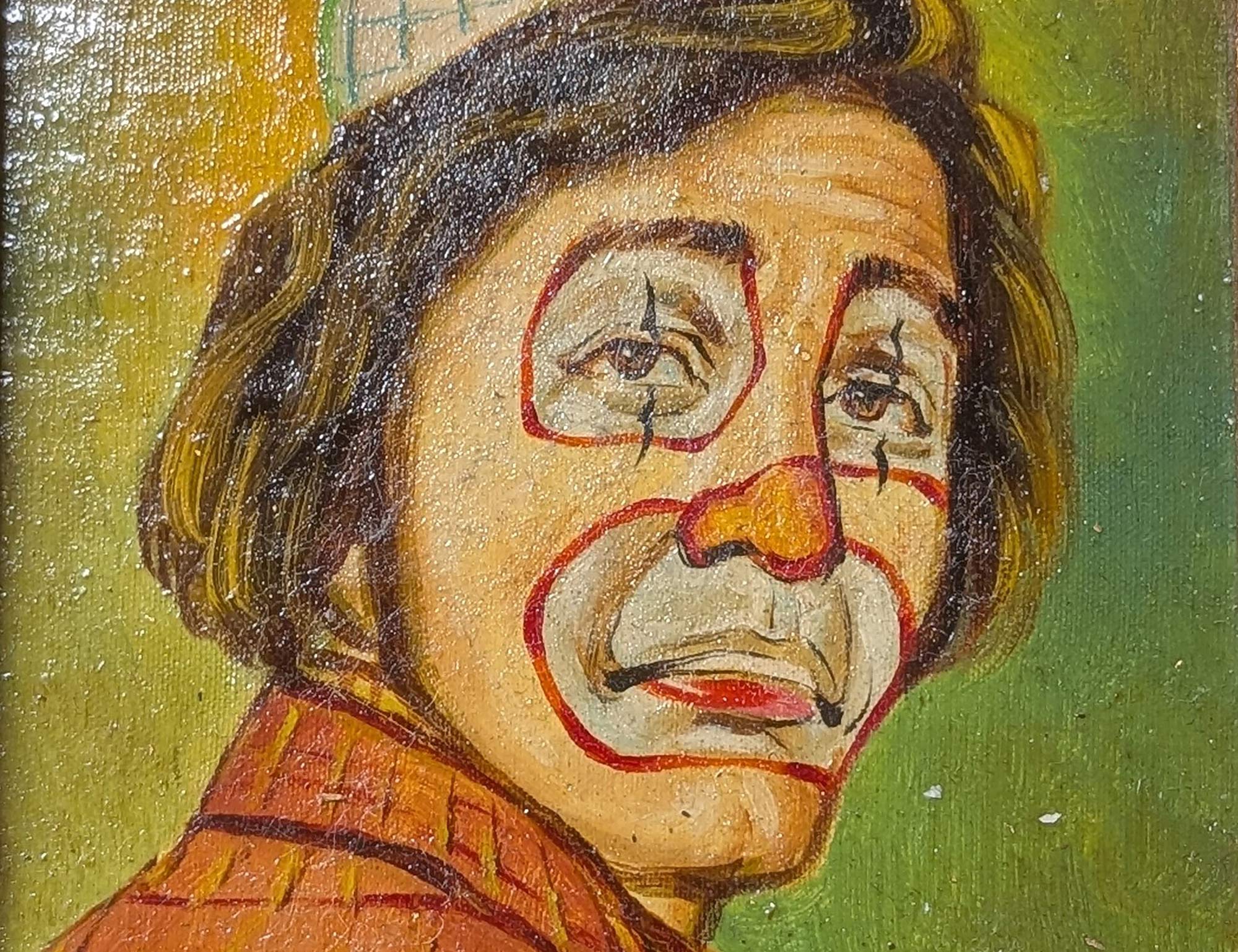 A close up of an oil painting of a sad looking clown's face